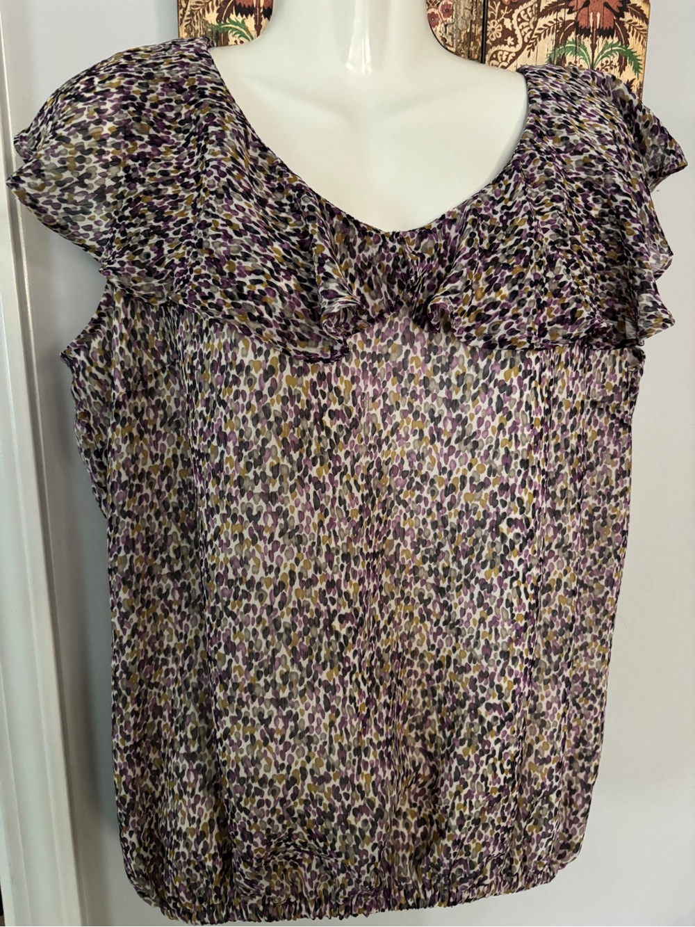 Attention brand NWOT sleeveless with flutter collar